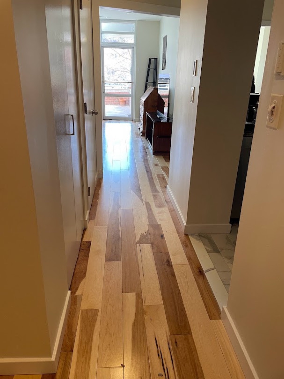 Refinished hardwood hallway and interior trim